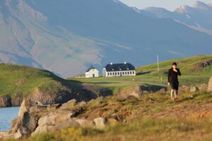 Live and work in Ireland | Rural Ireland man walking passed his cottage