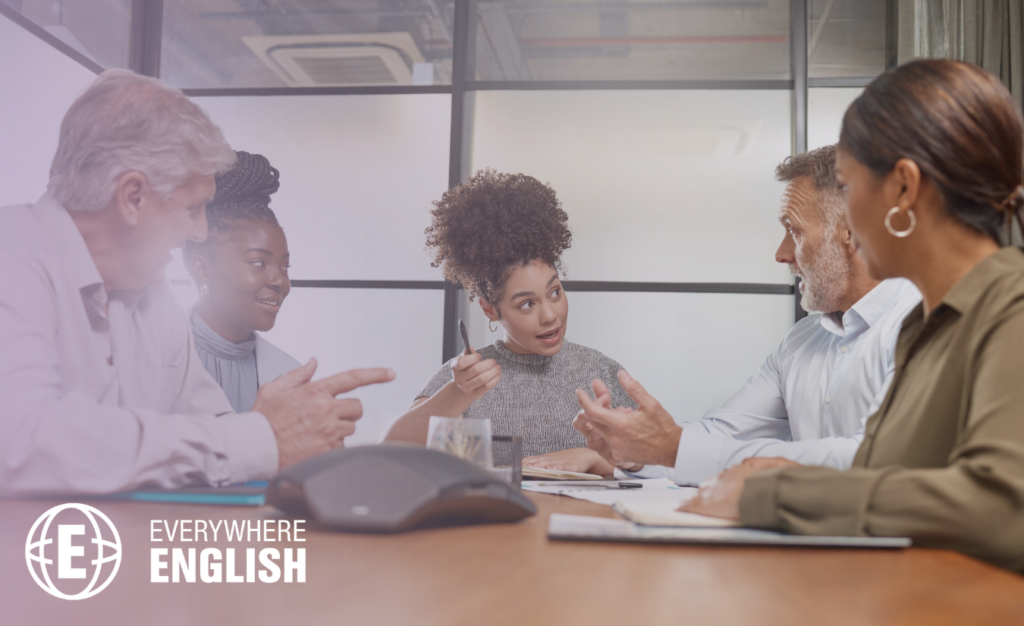 Group of five professionals comparing options for the best online Business English course.