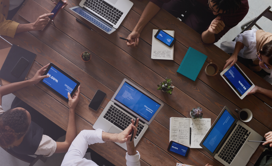 Professionals discussing email etiquette and writing effective business emails at work.